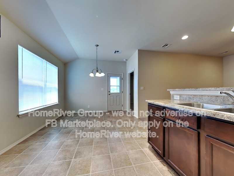 6616 N 128th East Ave - Photo 5 of 24