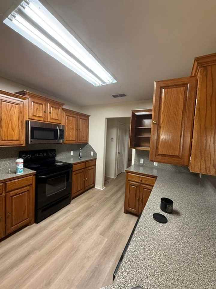 6609 Inverness St - Photo 4 of 20