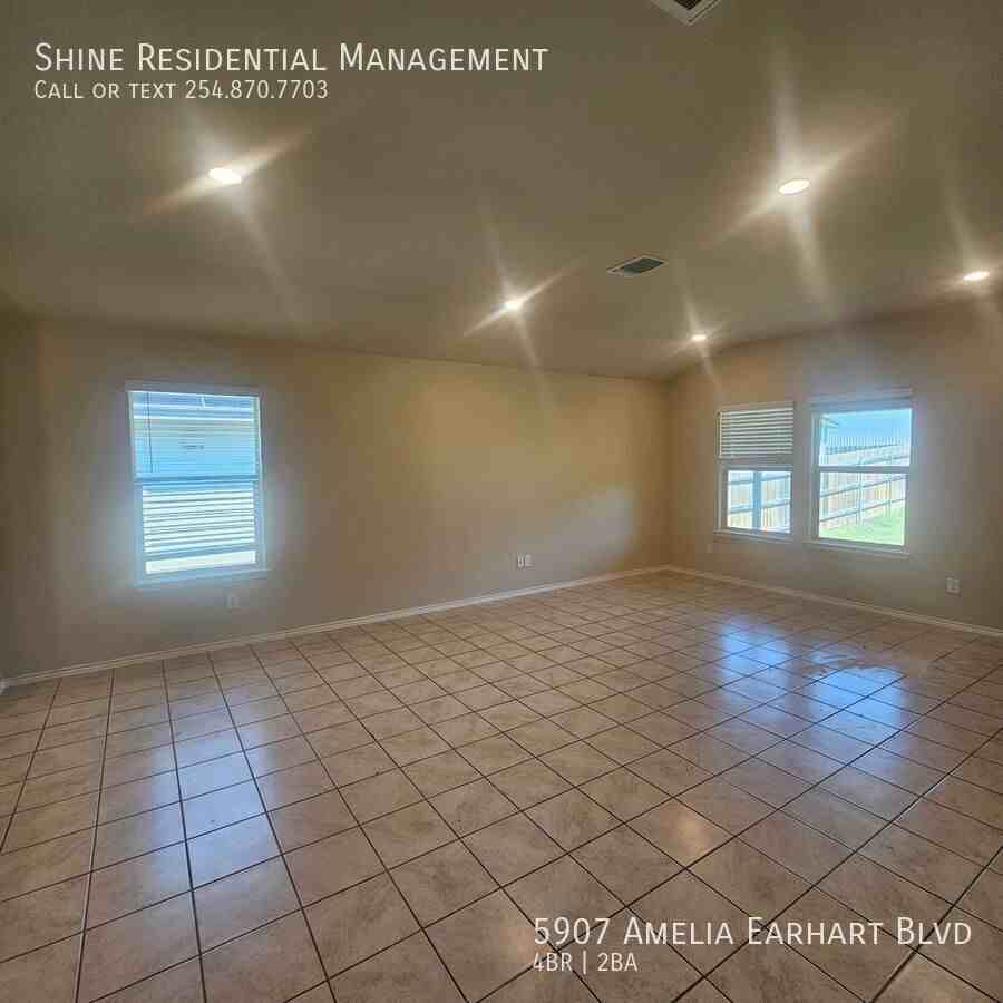 5907 Amelia Earhart Blvd - Photo 3 of 9