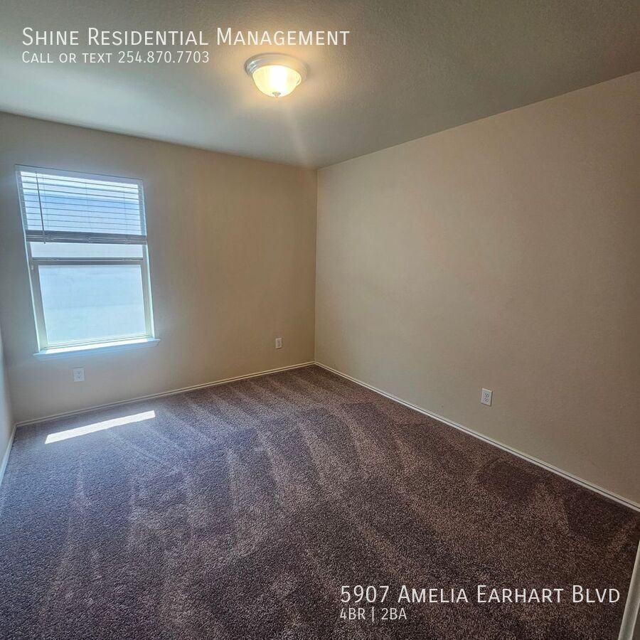 5907 Amelia Earhart Blvd - Photo 5 of 9