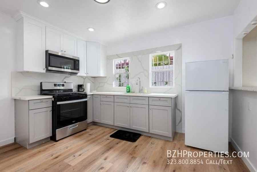 1165 W 38th St - Photo 3 of 13