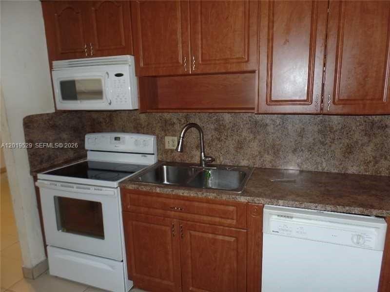 447 Ne 195th St #117 - Photo 2 of 17