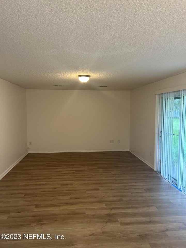 1603 Canopy Oaks Dr - Photo 3 of 7