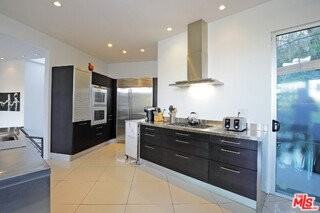 6767 Whitley Ter - Photo 6 of 8