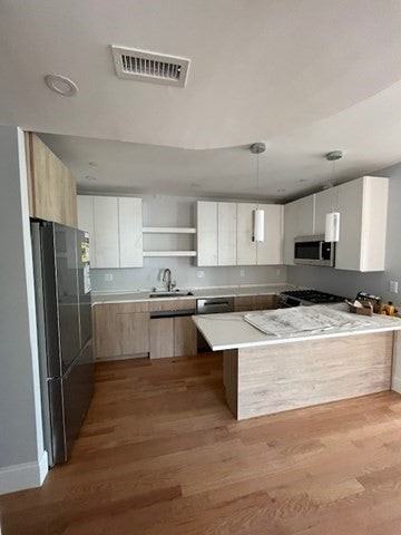 843 E 5th St - Photo 2 of 16