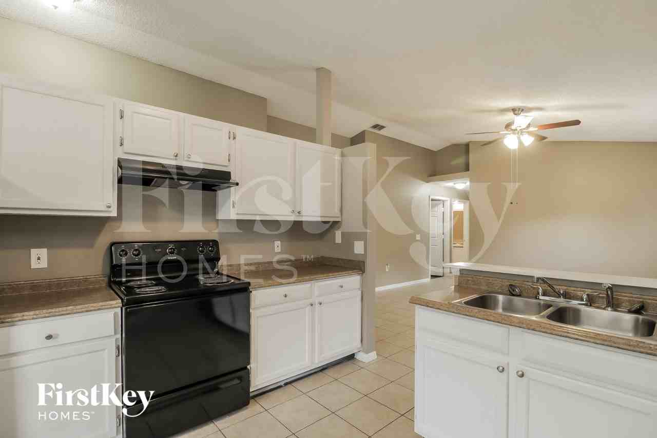 7560 Groveoak Dr - Photo 5 of 16
