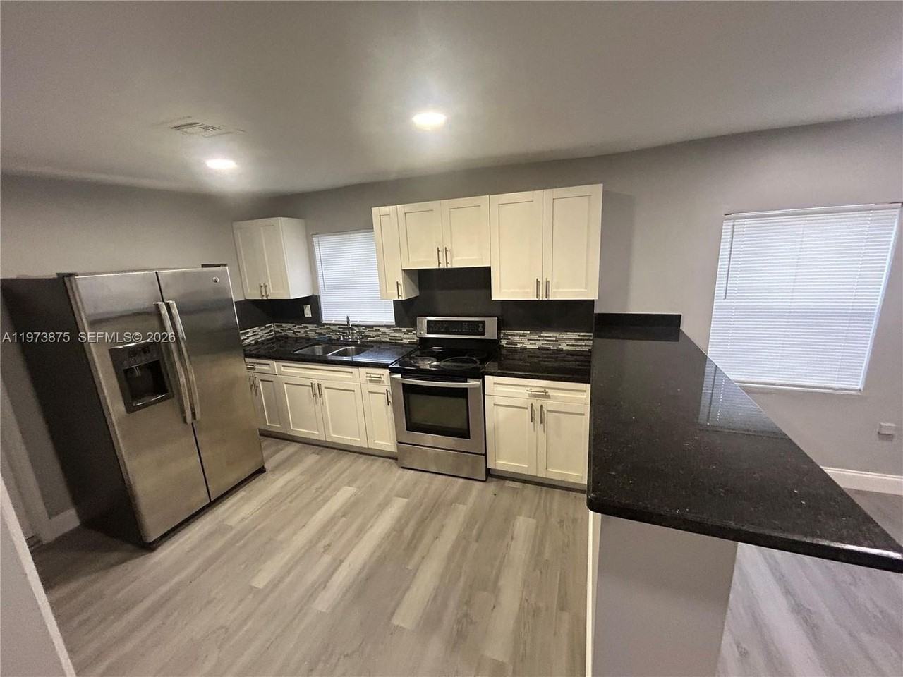1036 Nw 47th Ter - Photo 2 of 19