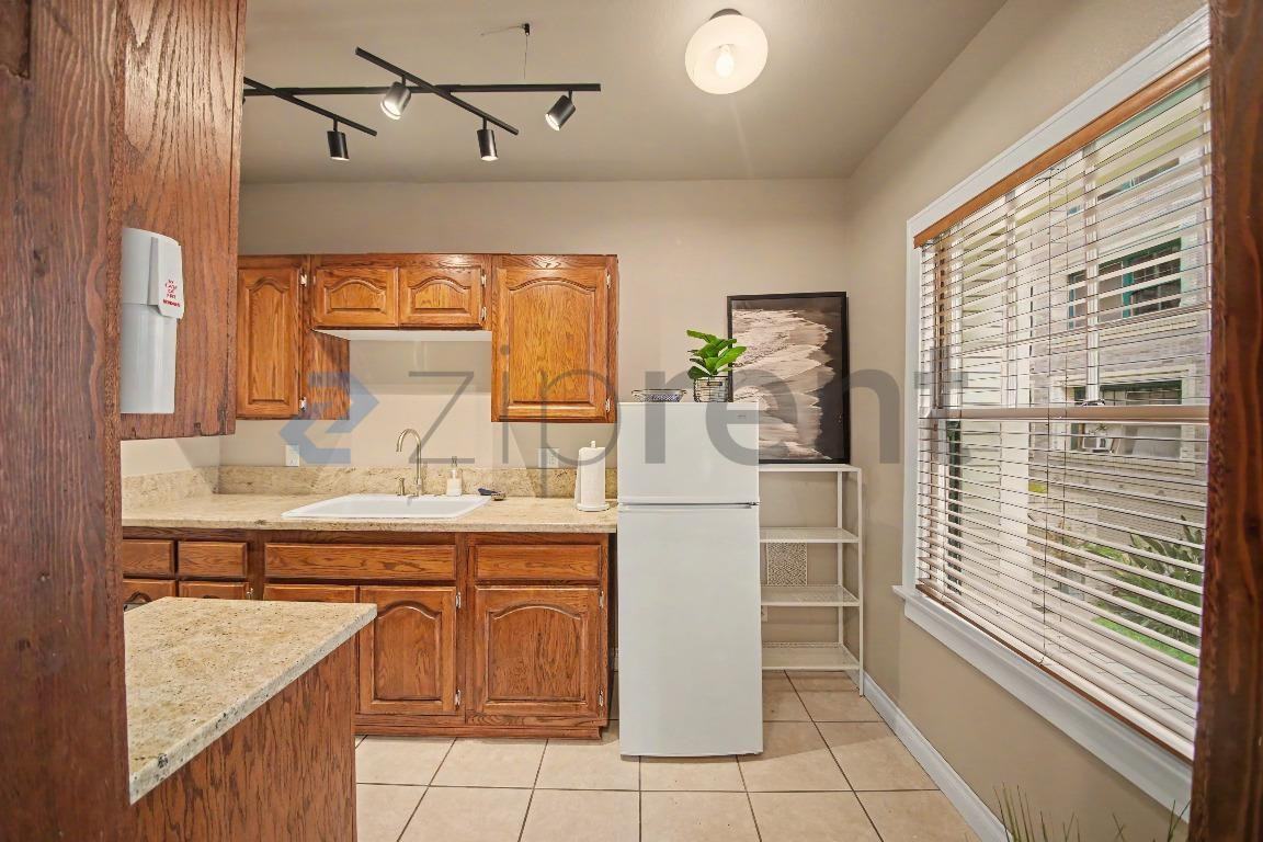 2121 James M Wood Blvd #120 - Photo 2 of 15