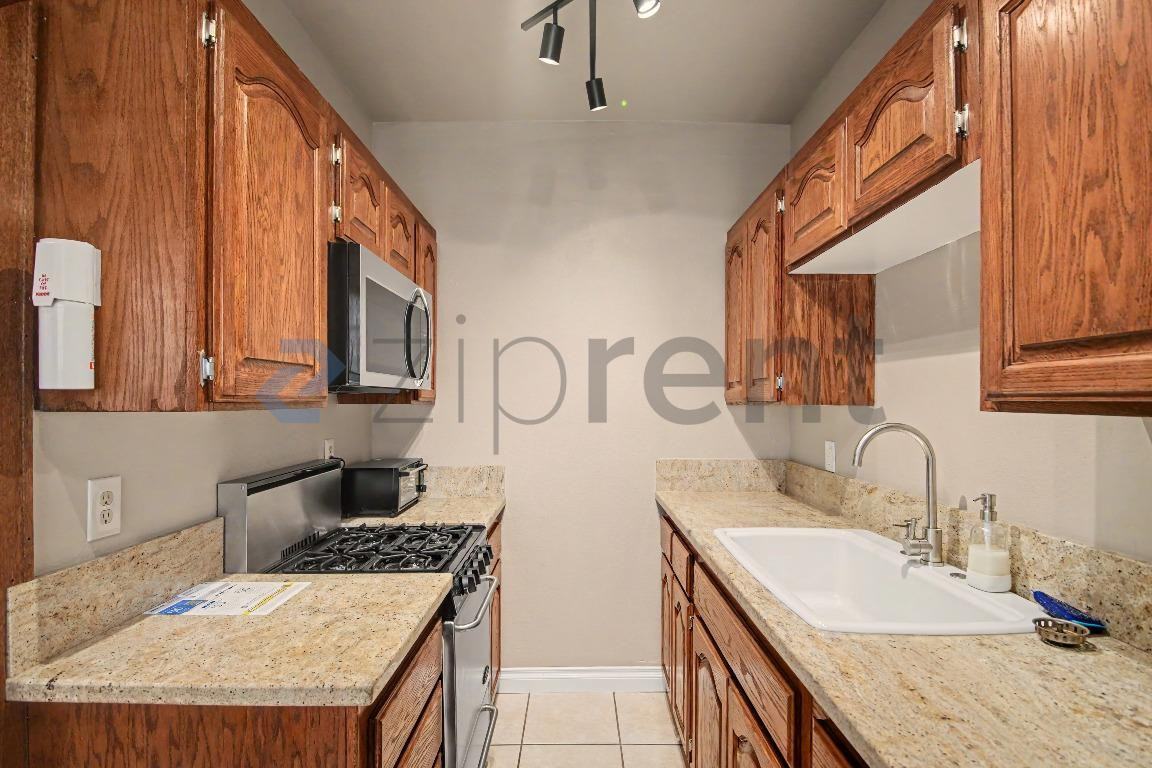 2121 James M Wood Blvd #120 - Photo 4 of 15
