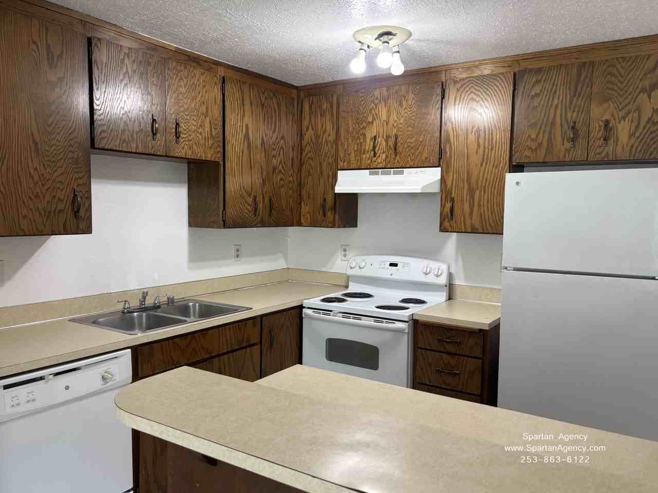 15716 63rd Street Ct E #B - Photo 5 of 16