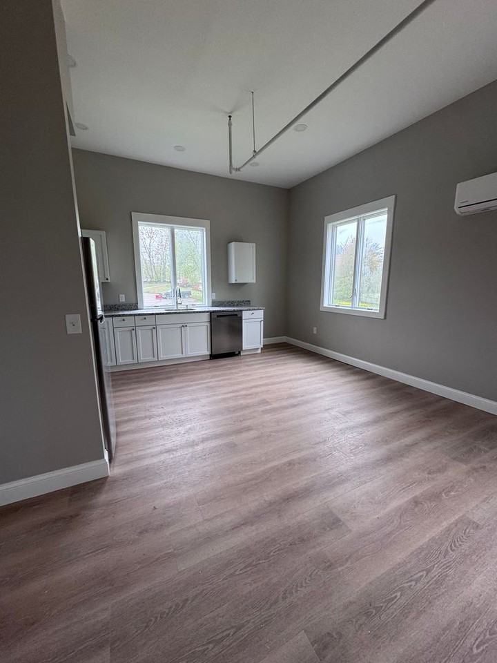 Newly Constructed Building featuring 16 Modern Apartments - Photo 3 of 12
