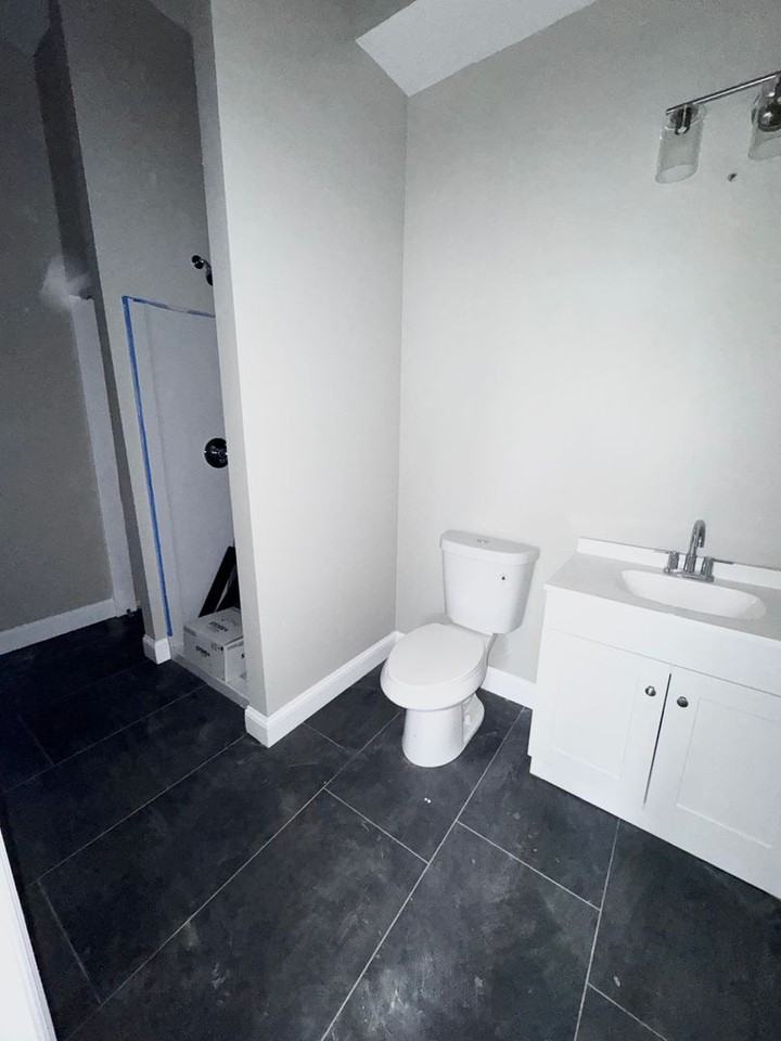 Newly Constructed Building featuring 16 Modern Apartments - Photo 5 of 12
