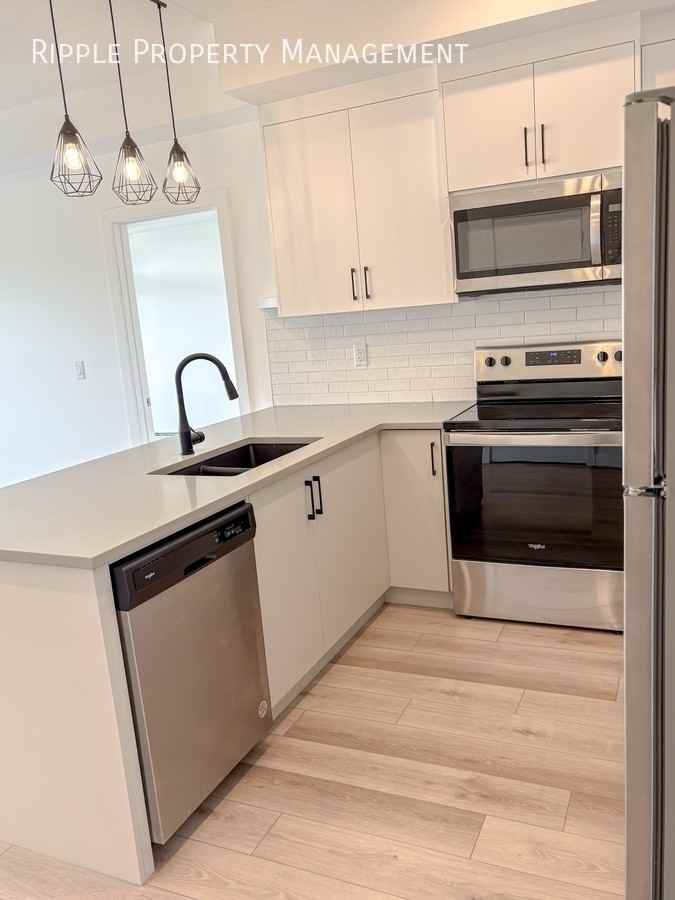 205 Spring Creek Common Sw #305 - Photo 3 of 17