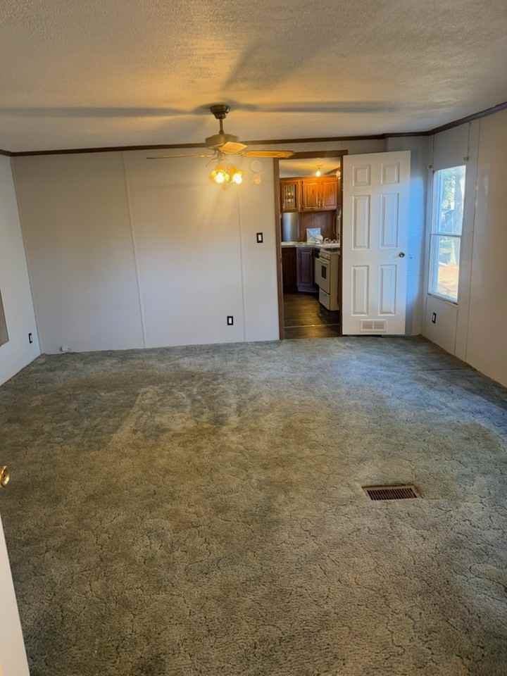 Whispering Pines Mobile Home - Photo 7 of 12