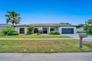 featured image of 16610 Royal Poinciana Ct
