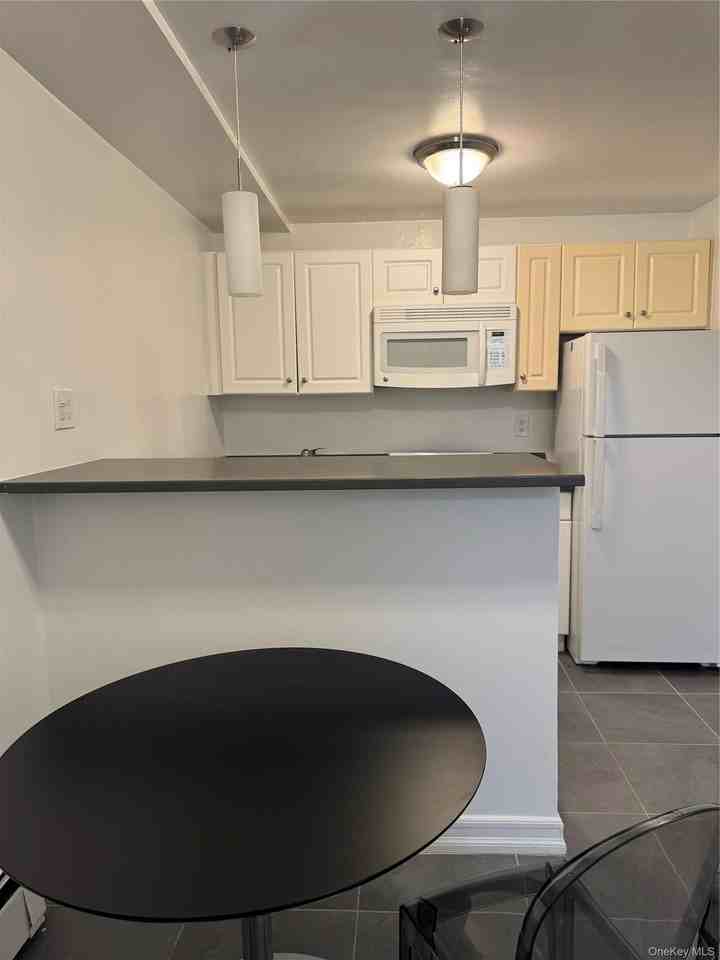 8321 Lefferts Blvd - Photo 3 of 6