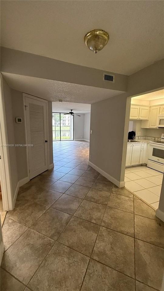 1232 S Military Trl #1911 - Photo 4 of 37