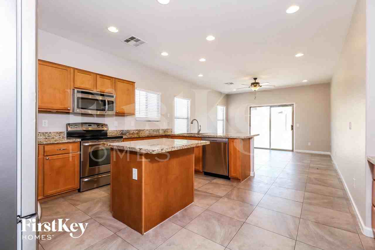 1127 S 220th Dr - Photo 5 of 15