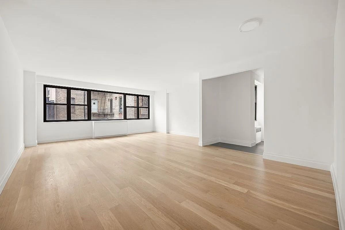 115 E 9th St - Photo 2 of 7