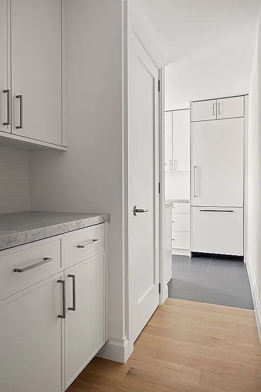115 E 9th St - Photo 4 of 7