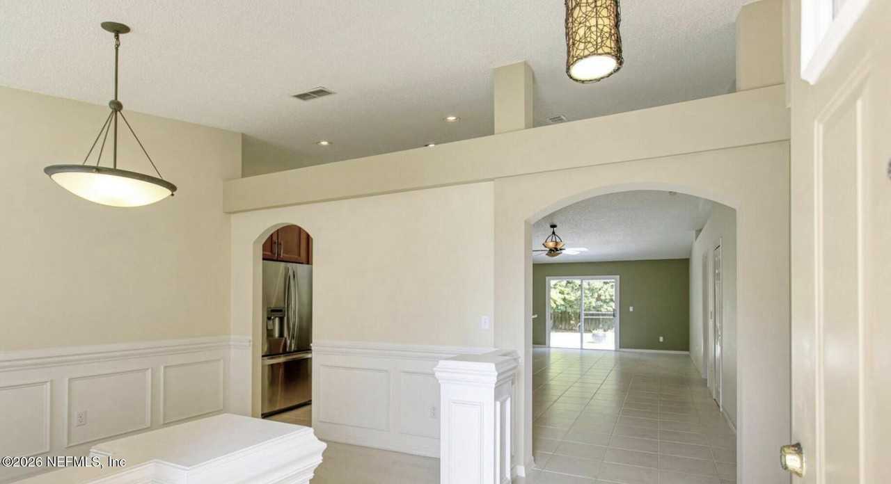 13031 Chets Creek Dr N - Photo 4 of 33