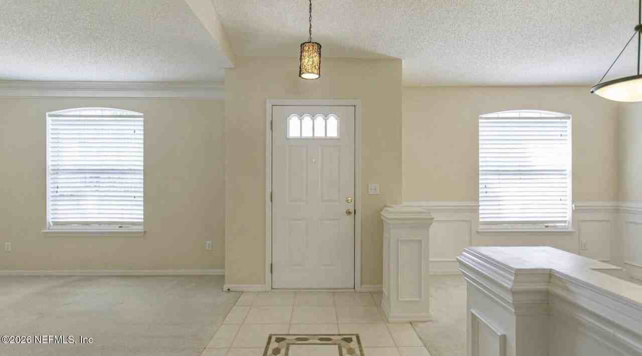 13031 Chets Creek Dr N - Photo 5 of 33