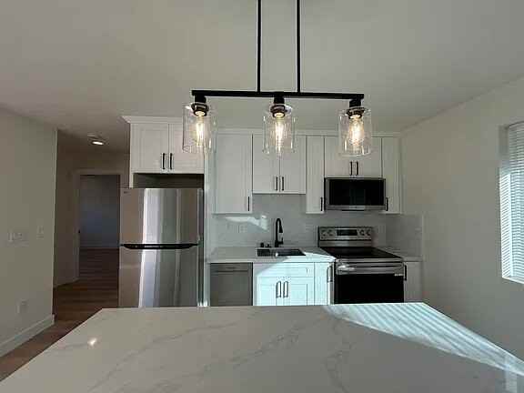 115 1/2 Henderson Way - Photo 3 of 13