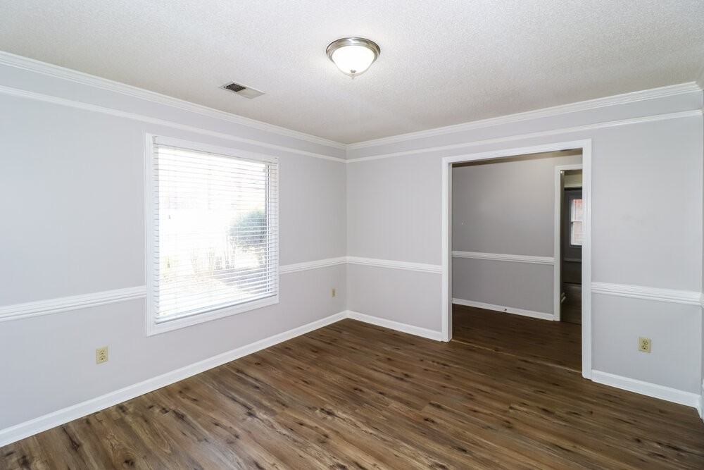 8815 Chimneyrock Blvd - Photo 7 of 17