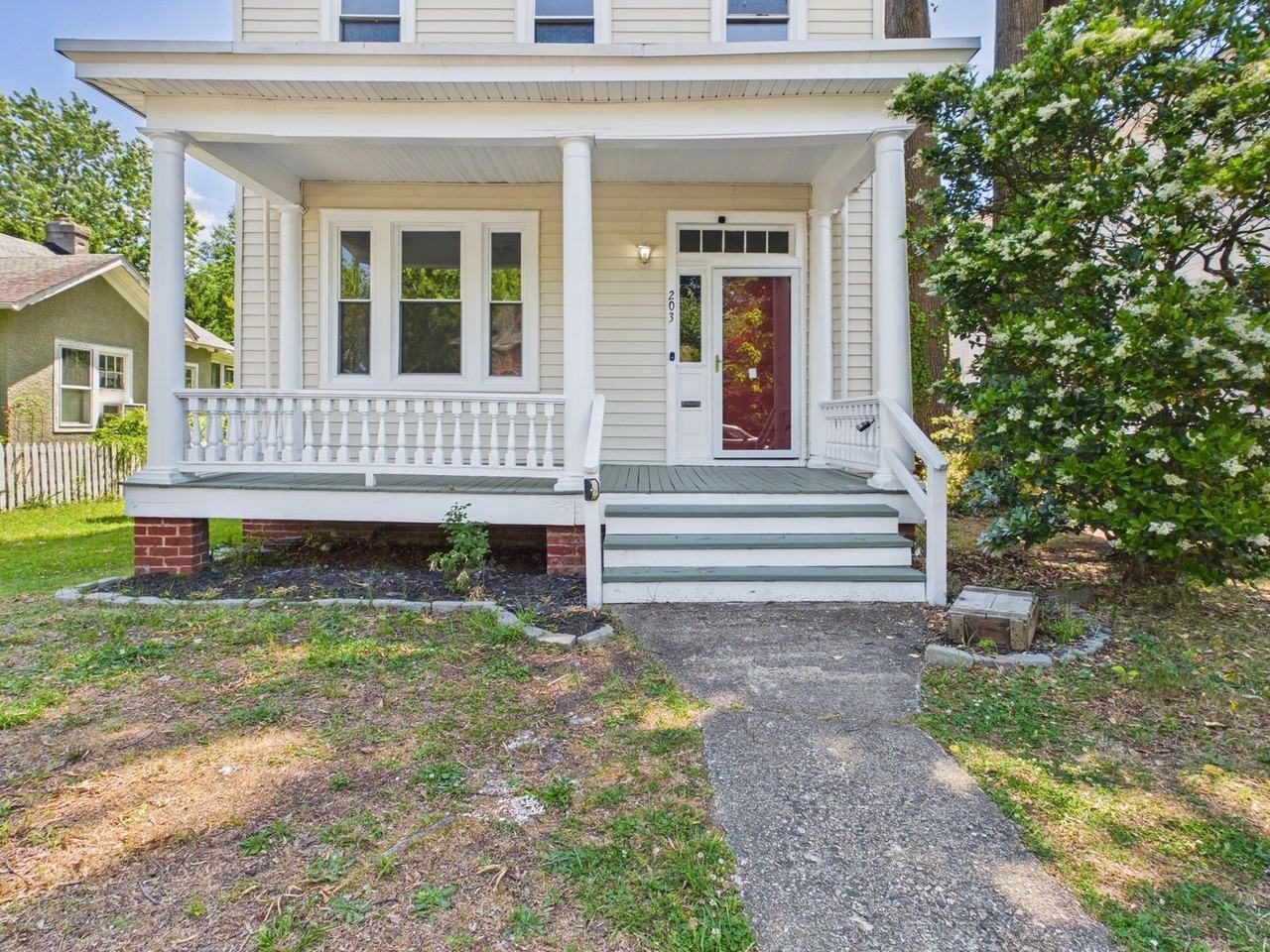 203 W 33rd St - Photo 2 of 40