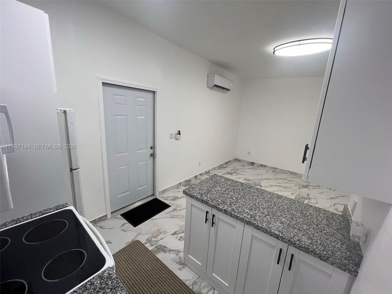 1720 Nw 180th Ter #1 - Photo 4 of 14