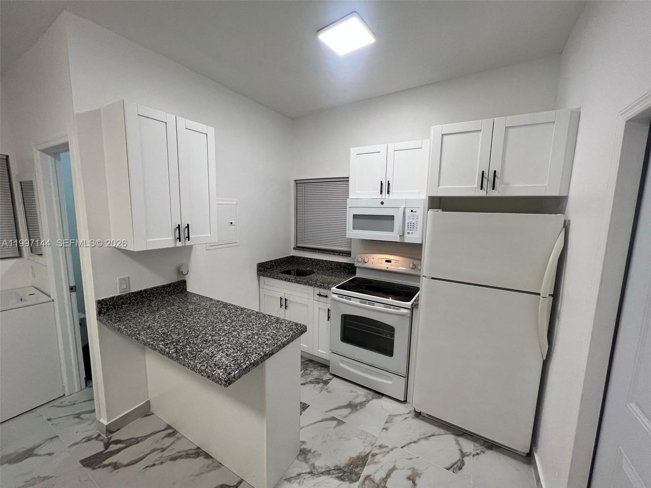 1720 Nw 180th Ter #1 - Photo 6 of 14