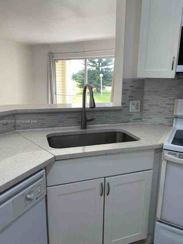 3441 Nw 44th St #104 - Photo 7 of 26