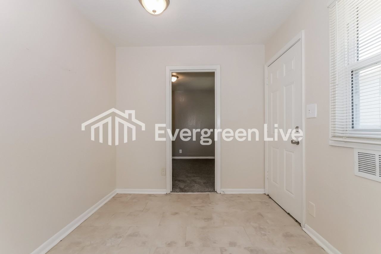1124 E 84th Ter - Photo 6 of 15