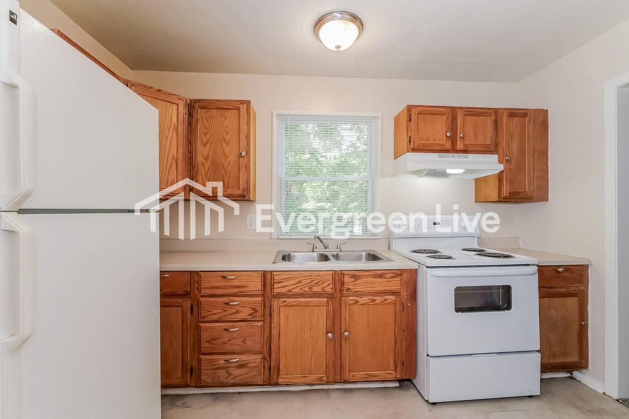 1124 E 84th Ter - Photo 7 of 15