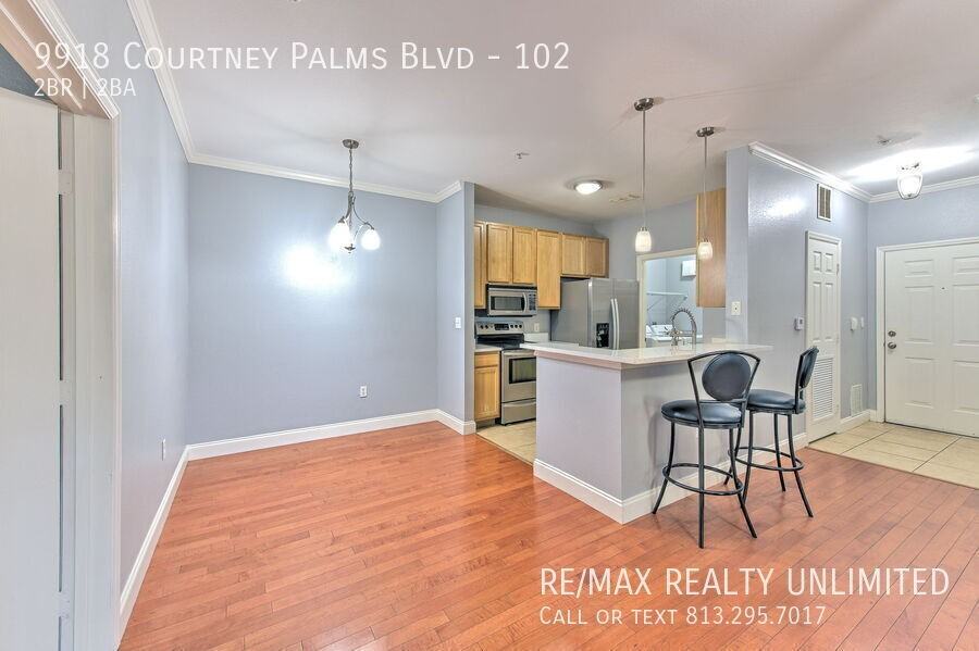 9918 Courtney Palms Blvd #102 - Photo 5 of 34