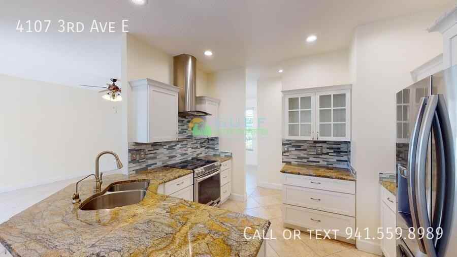 4107 3rd Ave E - Photo 5 of 36