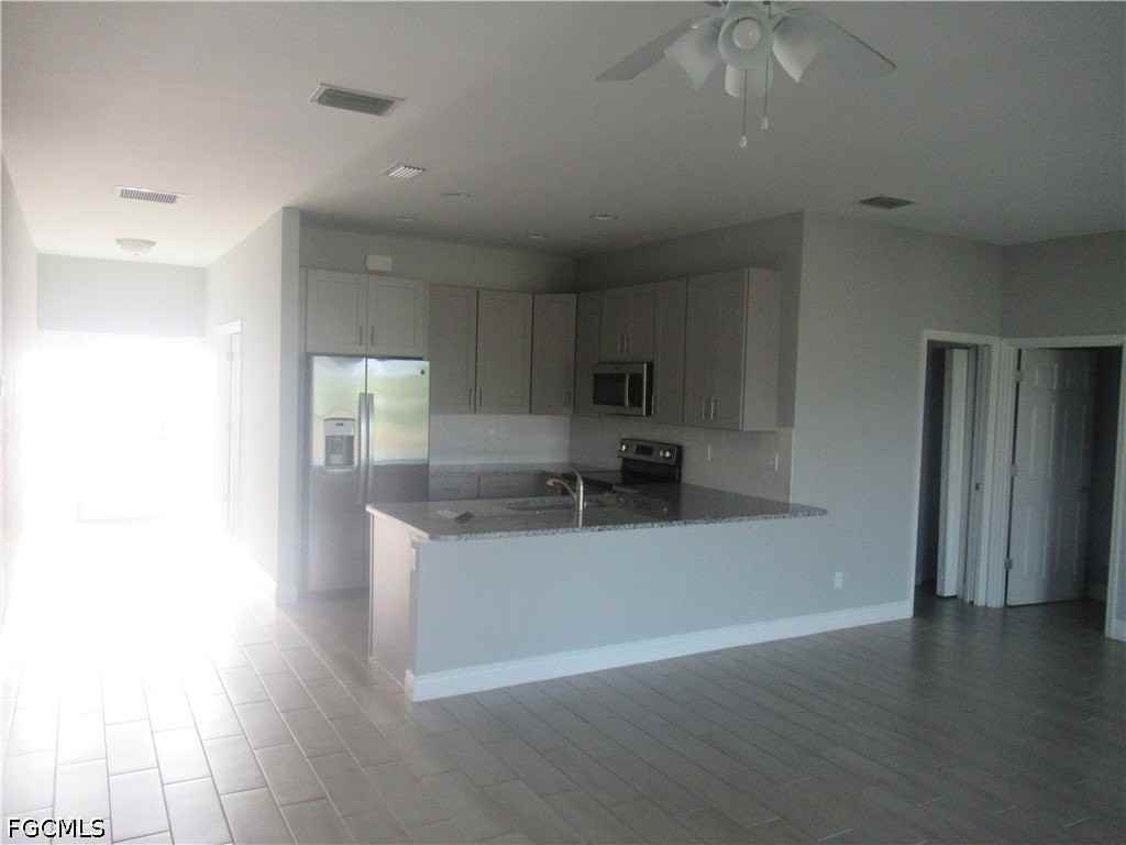 3241 Nw 41st Pl - Photo 7 of 13