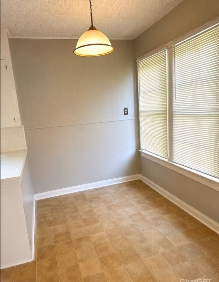 2370 Avenue C - Photo 3 of 5