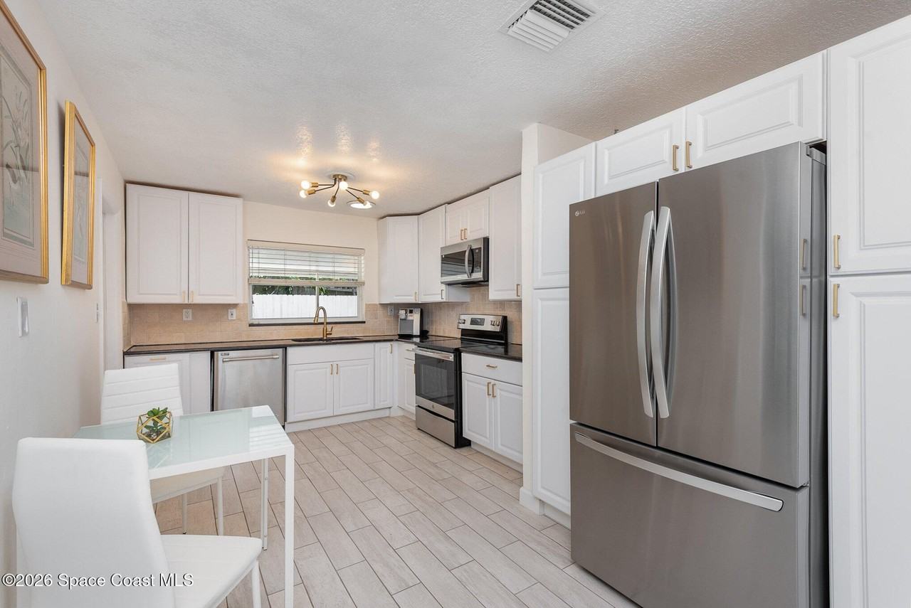 705 3rd Ave - Photo 7 of 26