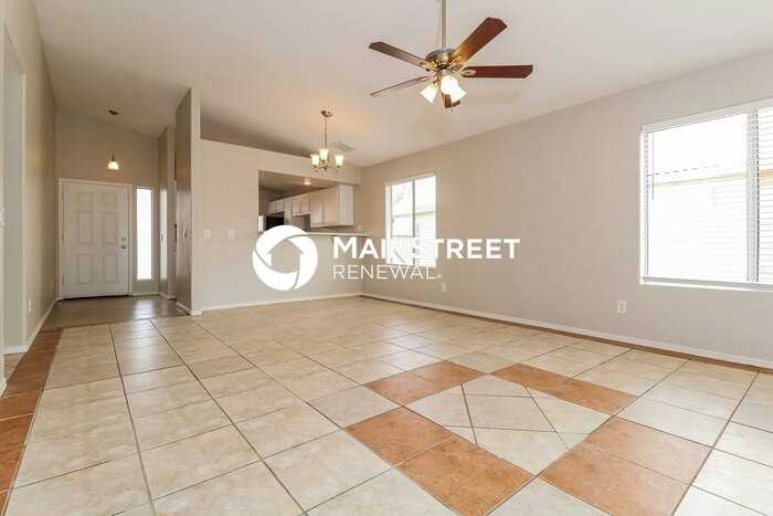 7721 W Rancho Dr - Photo 4 of 16