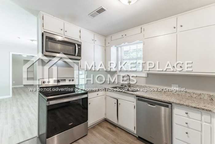 6517 Marsh Ave Nw - Photo 7 of 31