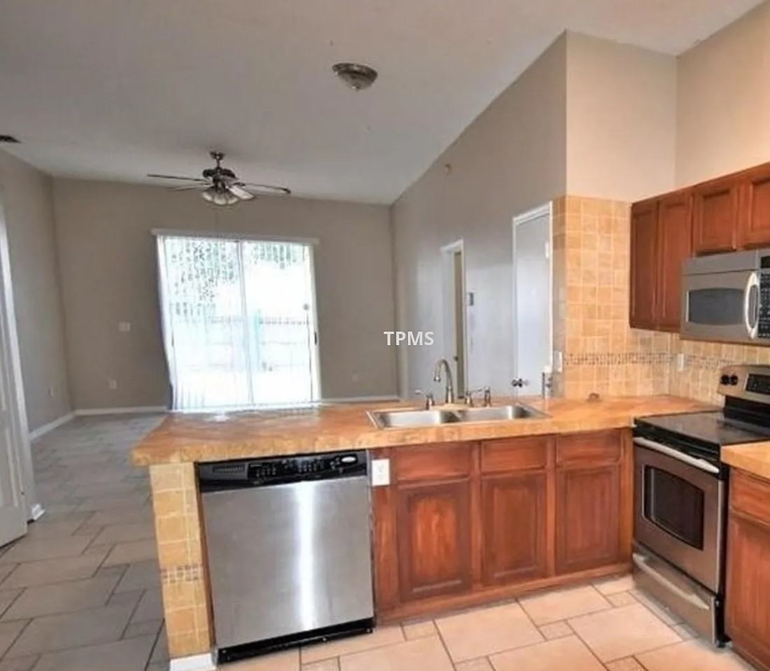 12743 Woodbury Oaks Dr #1 - Photo 3 of 7