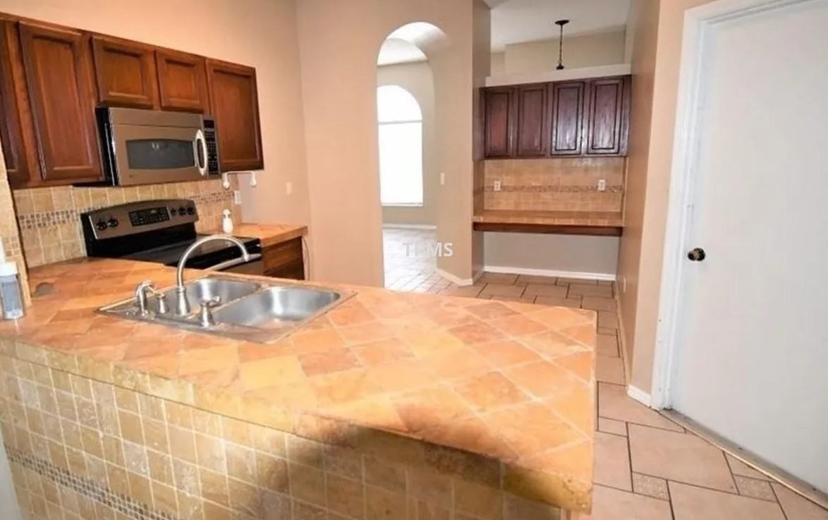 12743 Woodbury Oaks Dr #1 - Photo 4 of 7