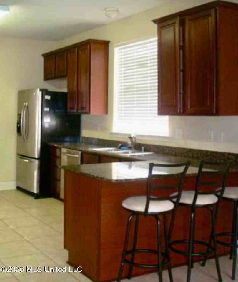 7709 Clamshell Ave - Photo 3 of 4