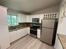 1135 92nd St #102 - Photo 1 of 1