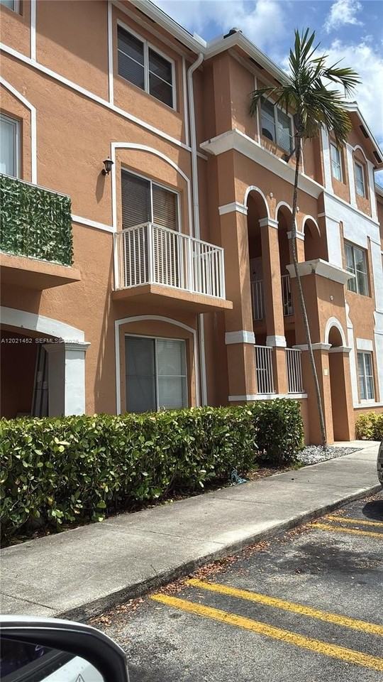 7250 Nw 177th St #211-16 - Photo 2 of 12