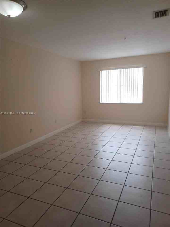 7250 Nw 177th St #211-16 - Photo 4 of 12