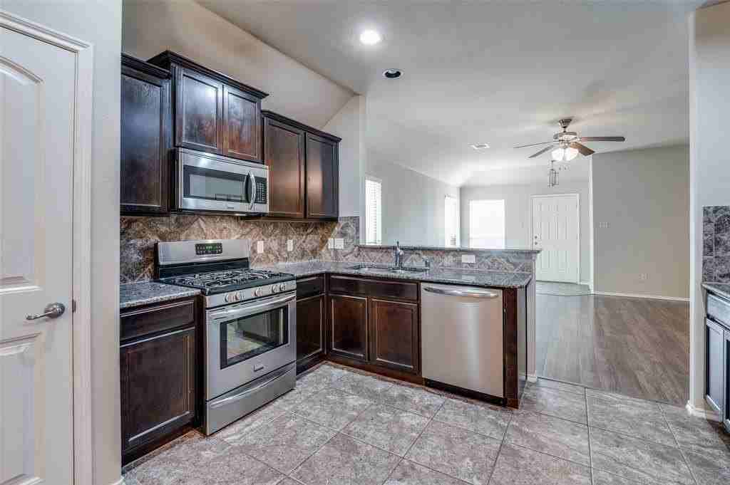 9908 Pronghorn Rd - Photo 7 of 26