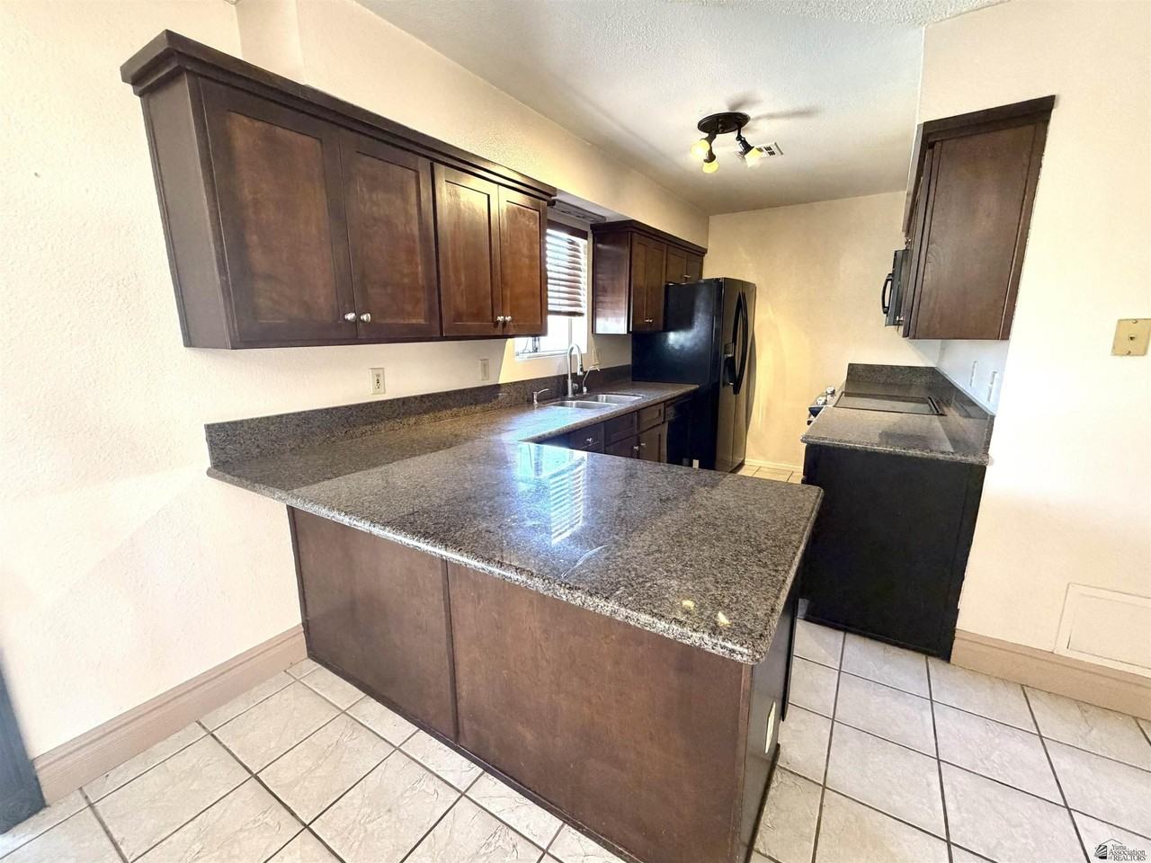 4584 W 18th Pl - Photo 4 of 16