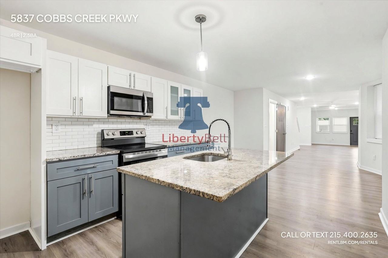 5837 Cobbs Creek Pkwy - Photo 4 of 19